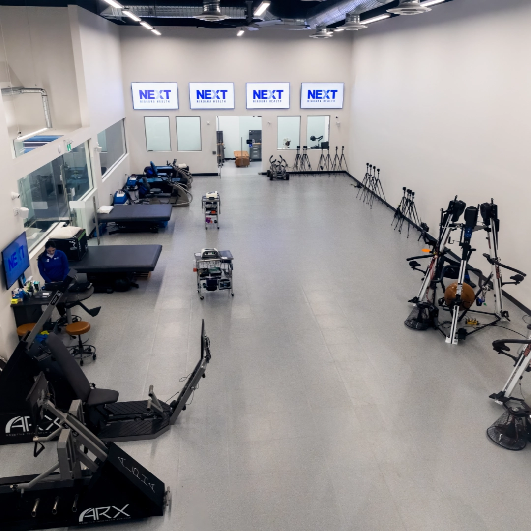 NEXT Niagara Health reception area with seating and clinic signage.
